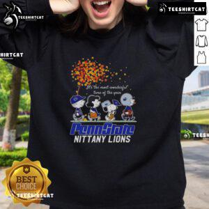 Alt Text: Happy Snoopy and friends in Penn State Nittany Lions sweatshirt celebrating autumn, perfect for the season's festivities.