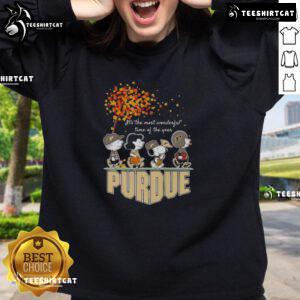 Alt Text: Happy Snoopy and friends on Purdue sports team sweatshirt celebrating autumn and the joy of the season.