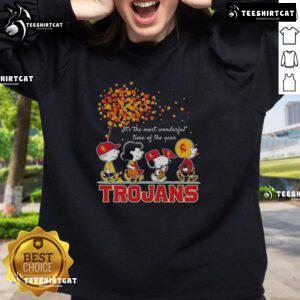 Alt Text: Happy Snoopy and friends in Trojans sports team autumn sweatshirt celebrating the most wonderful time of the year.