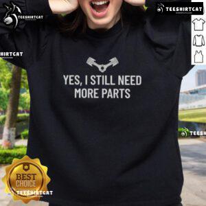 Cozy 'Hot Yes I Still Need More Parts' sweatshirt in a trendy design, perfect for automotive enthusiasts and casual wear.