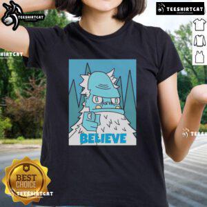Stylish 'Nice Abominable Snowman Believe' ladies tee featuring a playful snowman design, perfect for winter wear.