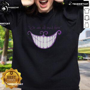 Cozy 'Nice Cheshire Cat Smile - We Are All Mad Here' sweatshirt featuring a whimsical design for fans of Alice in Wonderland.