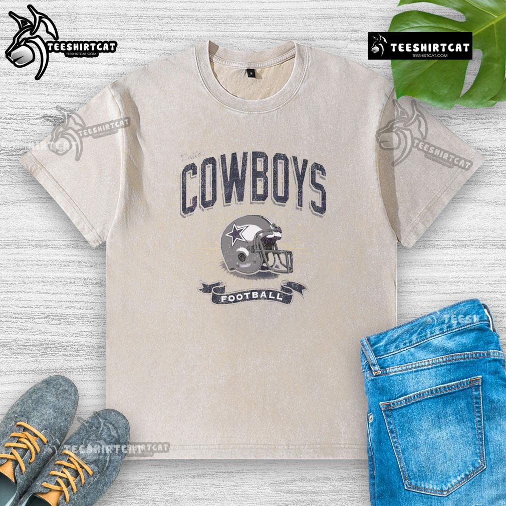 Alt Text: Distressed vintage washed t-shirt featuring a Dallas Cowboys football helmet design for fans.