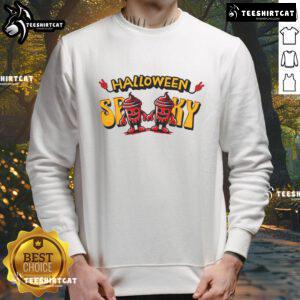 Spooky skeleton drink cup design on a cozy Halloween sweatshirt for festive fall celebrations.