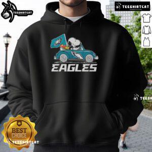 Philadelphia Eagles flag hoodie featuring Snoopy and Woodstock driving a car, perfect for fans and cozy wear.