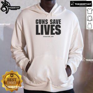 Charlie Kirk wearing 'Guns Save Lives' hoodie at 2018 event, promoting Second Amendment rights and personal freedom.