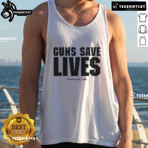 Charlie Kirk wearing a 'Guns Save Lives' tank top at an event in 2018, promoting Second Amendment rights.