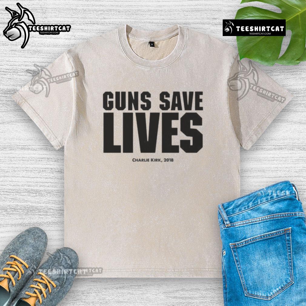 Official Charlie Kirk 'Guns Save Lives' 2018 washed t-shirt showcasing pro-Second Amendment message in casual style.