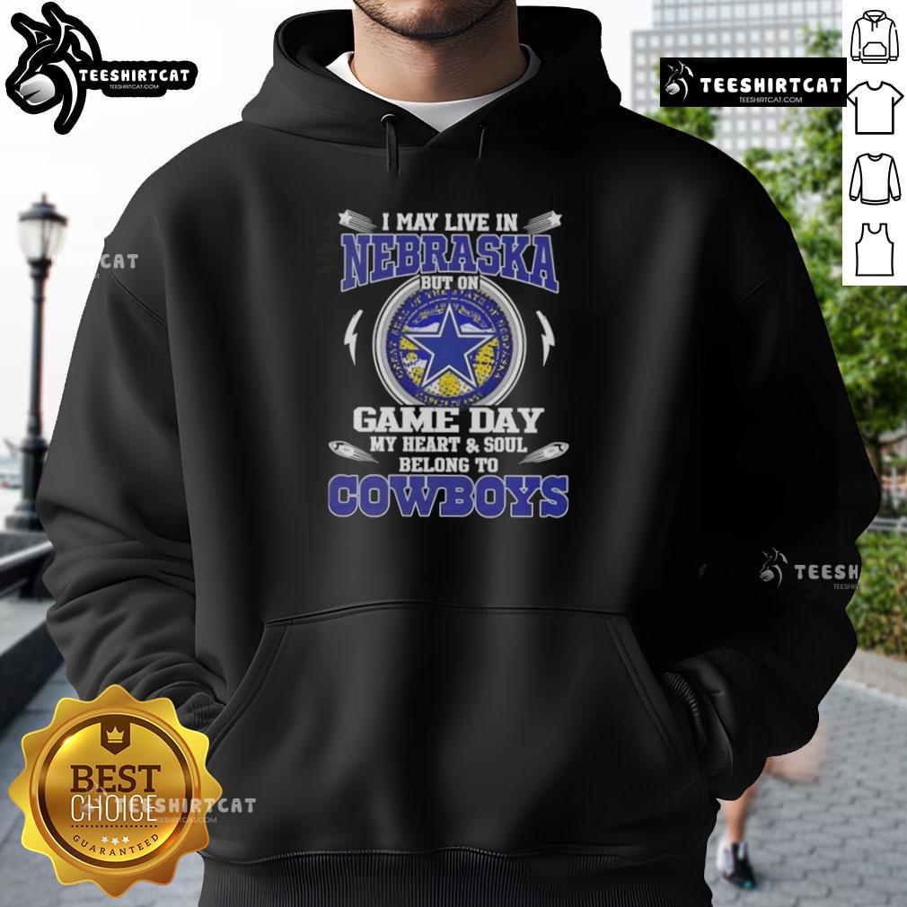 Dallas Cowboys hoodie with 'I may live in Nebraska, but on game day, my heart belongs to Dallas Cowboys' text.