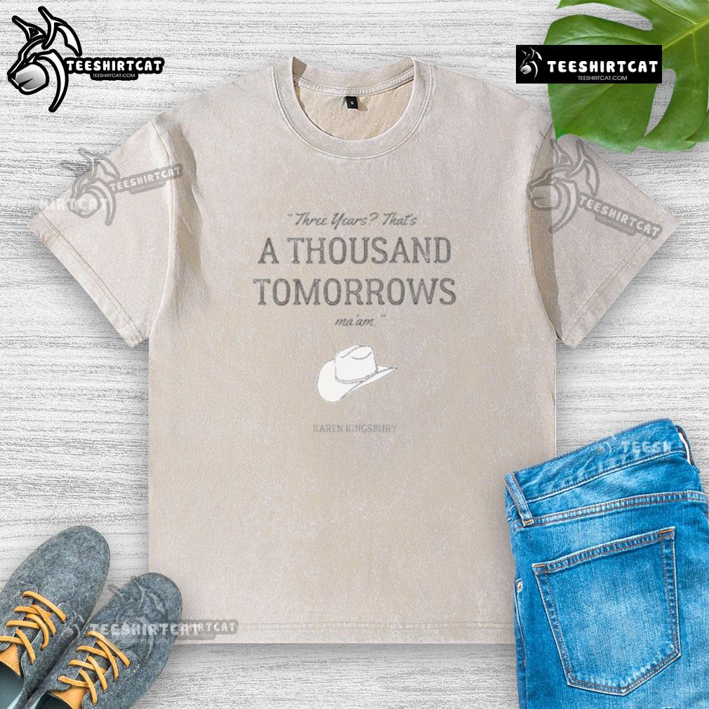 Alt Text: Official Karen Kingsbury Bookstore A Thousand Tomorrows washed t-shirt featuring a soft design for fans.