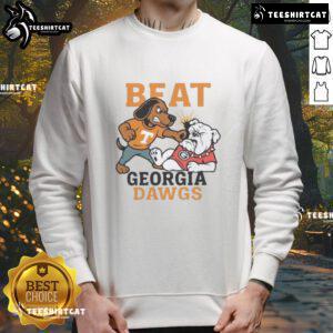 Official Tennessee Volunteers sweatshirt featuring mascots celebrating victory over Georgia Bulldogs Dawgs.