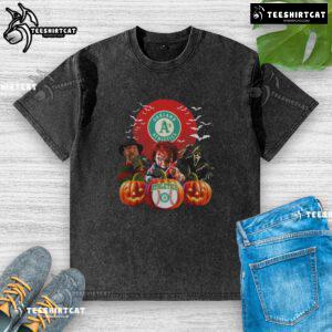 Official Oakland Athletics MLB Horror Movie Halloween washed t-shirt featuring spooky graphics and team logo.