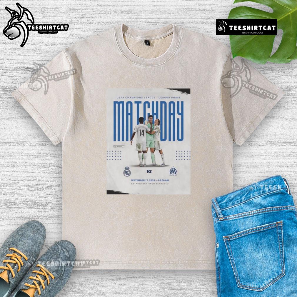 Official Real Madrid vs Marseille UEFA Champions League 2025 Matchday washed t-shirt featuring team logos and vibrant design.