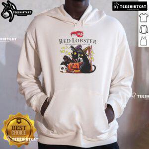 Official Red Lobster black cat witch pumpkin haunted house Halloween hoodie featuring a spooky festive design.