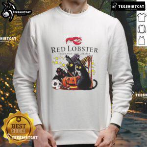Official Red Lobster Black Cat Witch Pumpkin Haunted House Halloween Sweatshirt featuring festive Halloween designs.