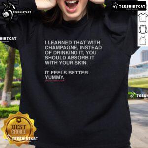 Shota Imanaga sweatshirt featuring the phrase 'I learned that champagne instead of drinking it, absorb it with your skin'.