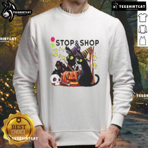 Official The Stop And Supermarket Black Cat Witch Pumpkin Haunted House Halloween Sweatshirt for festive style.