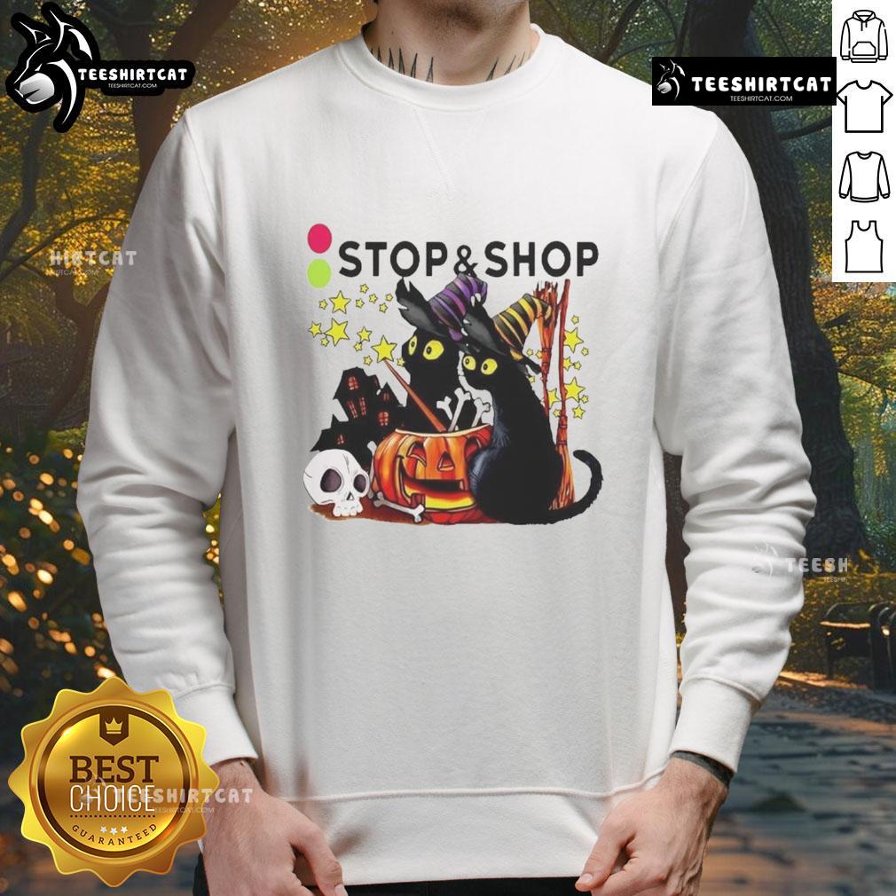 Official The Stop And Supermarket Black Cat Witch Pumpkin Haunted House Halloween Sweatshirt for festive style.