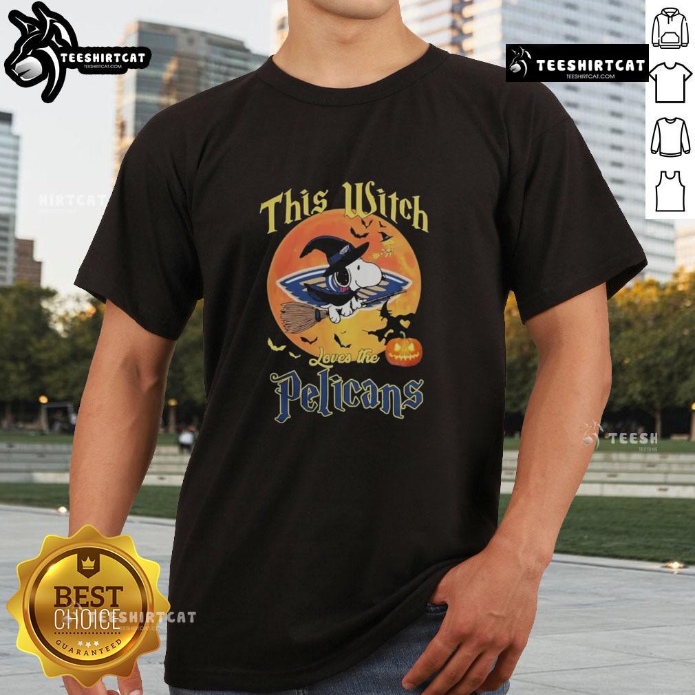 Alt Text: Official This Witch Loves The New Orleans Pelicans Snoopy Halloween T-Shirt featuring Snoopy in a witch costume.