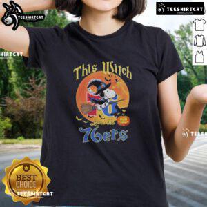 Official This Witch Loves The Philadelphia 76ers Snoopy Halloween Ladies Tee featuring playful witch and basketball design.