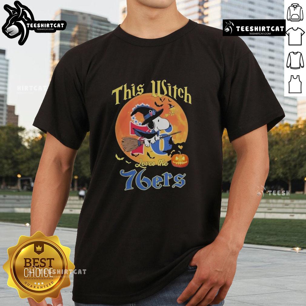 Official This Witch Loves The Philadelphia 76ers Snoopy Halloween T-Shirt featuring a playful witch and Snoopy design.