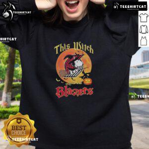 Alt Text: Official Snoopy Halloween sweatshirt for fans, featuring 'This Witch Loves the Portland Trail Blazers' design.