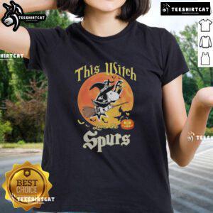 Official 'This Witch Loves the San Antonio Spurs' Snoopy Halloween Ladies Tee featuring a spooky design and team spirit.