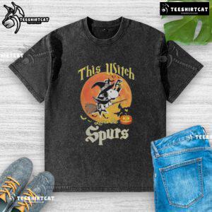 Alt Text: Official This Witch Loves The San Antonio Spurs Snoopy Halloween T-Shirt featuring a festive design and vibrant colors.