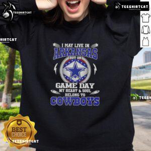Original sweatshirt featuring 'I May Live In Arkansas But On Game Day My Heart Belongs To Dallas Cowboys' design.