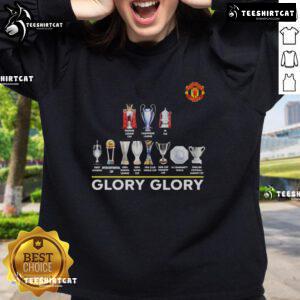 Alt Text: Original Manchester United Glory Glory Trophy Sweatshirt featuring team colors and iconic logo, perfect for fans.