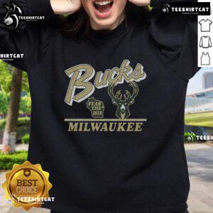Alt Text: Vintage Milwaukee Bucks Fly By sweatshirt featuring classic logo and retro design, perfect for basketball fans.