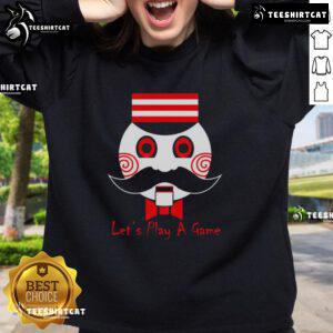 Premium Let's Play a Game Saw Movie sweatshirt featuring iconic horror design for fans of the Saw franchise.