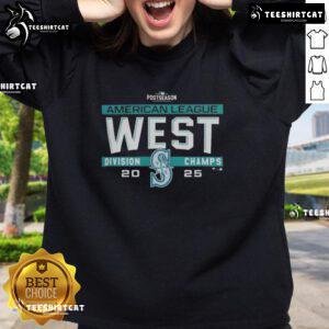 Alt Text: Premium Seattle Mariners MLB 2025 AL West Division Title postseason sweatshirt displayed in a locker room setting.