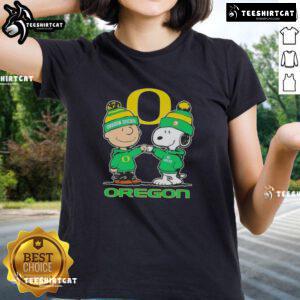 Alt Text: Premium Snoopy and Charlie Brown Oregon Ducks Football Skyline Ladies Tee featuring vibrant graphics and comfortable fit.