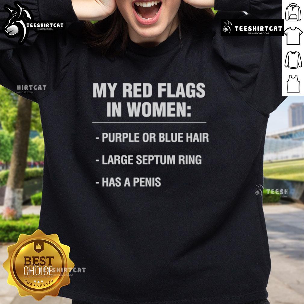 Alt Text: Woman in a purple sweatshirt with blue hair, showcasing 'My Red Flags in Women' design.