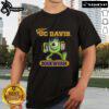 Alt Text: Top Monster Disney UC Davis Bookworm T-Shirt featuring a colorful graphic of a cute monster reading a book.