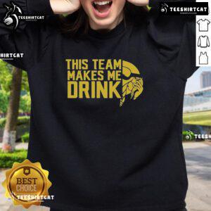Alt Text: Minnesota Vikings logo sweatshirt from Top This Team Makes Me Drink, showcasing team spirit and style.
