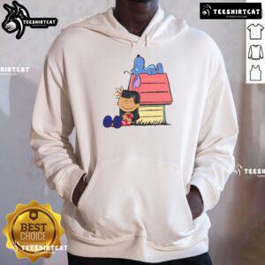 Alt Text: Cute Peanuts Snoopy X Stitch hoodie with 'It Means Nobody Gets Left Behind' design, perfect for fans of both characters.