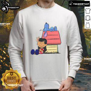 Alt Text: Cute Peanuts Snoopy X Stitch sweatshirt featuring It Means Nobody Gets Left Behind design, perfect for fans.