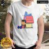 Alt Text: Cute Peanuts Snoopy X Stitch & Lilo T-shirt featuring It Means Nobody Gets Left Behind slogan in vibrant colors.