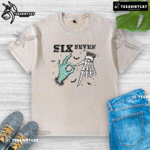Alt Text: Funny Halloween meme featuring a witch skeleton with hands on a washed t-shirt, perfect for spooky season fun.
