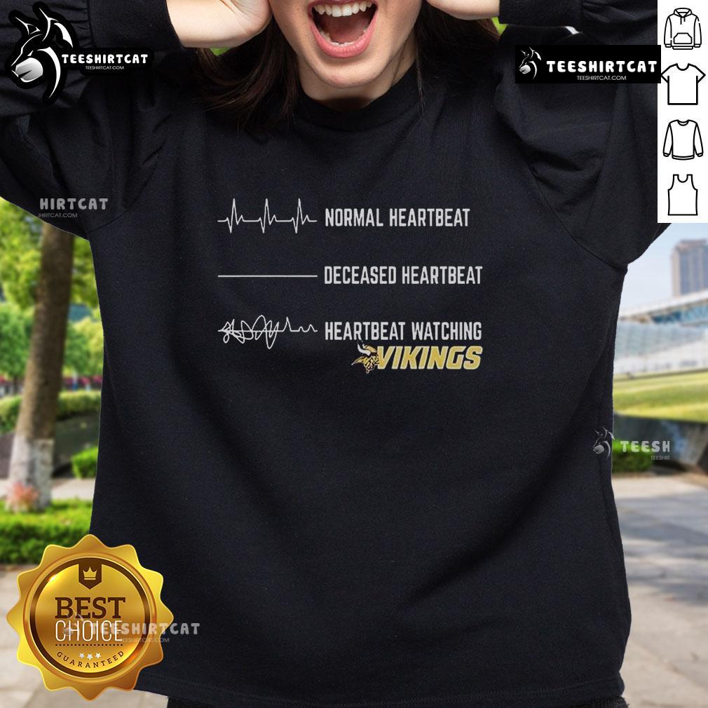 Funny Minnesota Vikings sweatshirt featuring a playful heartbeat design, perfect for fans and casual wear.