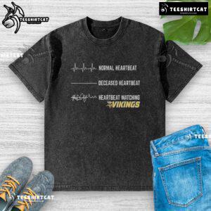 Funny heartbeat graphic on a Minnesota Vikings washed t-shirt, perfect for fans showing team spirit in style.