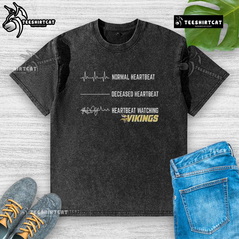 Funny heartbeat graphic on a Minnesota Vikings washed t-shirt, perfect for fans showing team spirit in style.