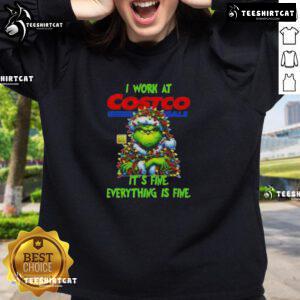 Cozy 'Good Grinch Christmas Tree' sweatshirt from Costco Wholesale, perfect for festive holiday celebrations.