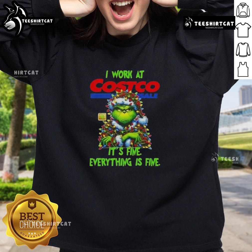 Cozy 'Good Grinch Christmas Tree' sweatshirt from Costco Wholesale, perfect for festive holiday celebrations.