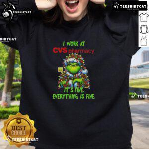 Cozy Good Grinch Christmas tree sweatshirt from CVS Pharmacy, featuring playful holiday design and festive colors.