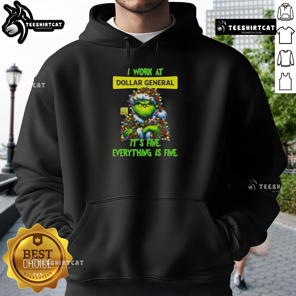 Cozy Good Grinch Christmas tree hoodie from Dollar General, featuring the phrase 'I work at it's fine, everything is fine.'