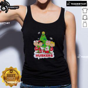 Good Peanuts characters wearing Nebraska Cornhuskers Christmas tank top, festive design perfect for holiday fans.