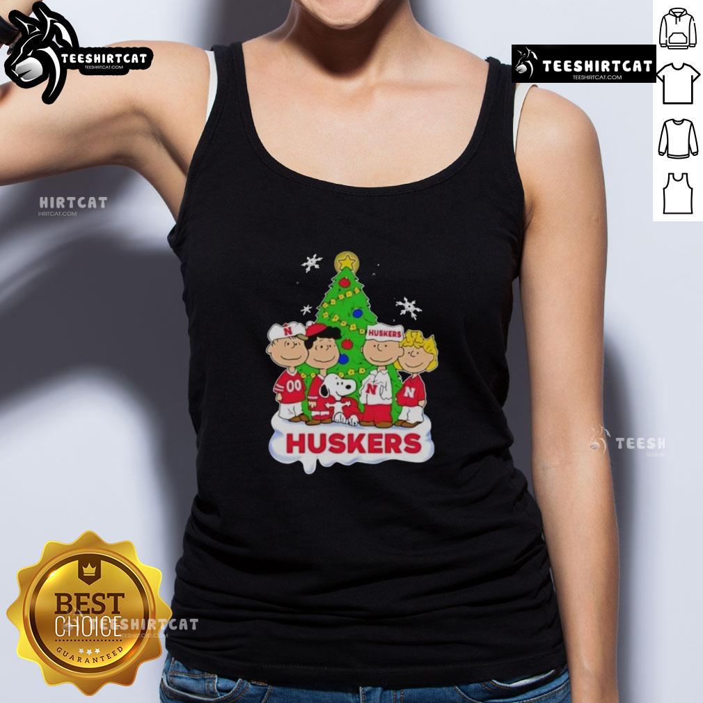 Good Peanuts characters wearing Nebraska Cornhuskers Christmas tank top, festive design perfect for holiday fans.